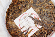 Red mark Iron tea cake forever photo:Puerh tea leaf