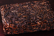 Dayi brick teaYellow leaf photo:Puerh tea leaf