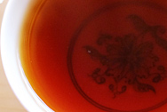 金柑普 青柑 写真:プーアル茶のお茶の色