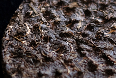 珍藏孔雀 那卡 写真:プーアール茶の茶葉裏面