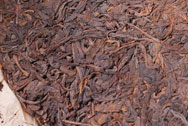 中茶牌簡体字鉄餅 写真:プーアール茶の茶葉
