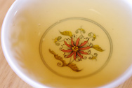 Xiaguan Green Tuo Cha, Golden label, Snow mountain photo:Color of puerh tea