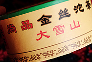 Xiaguan Green Tuo Cha, Golden label, Snow mountain photo:Puerh tea