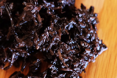 下関宮廷プーアル餅茶 XY特制 写真:プーアル茶葉底